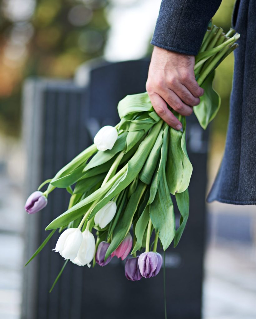 Gone,But,Not,Forgotten.,Cropped,Shot,Of,A,Man,Visiting